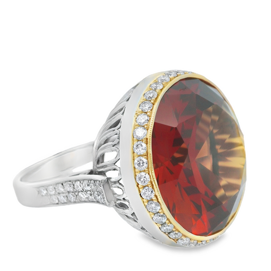 Orange Citrine Ring with a Diamond Halo in Platinum