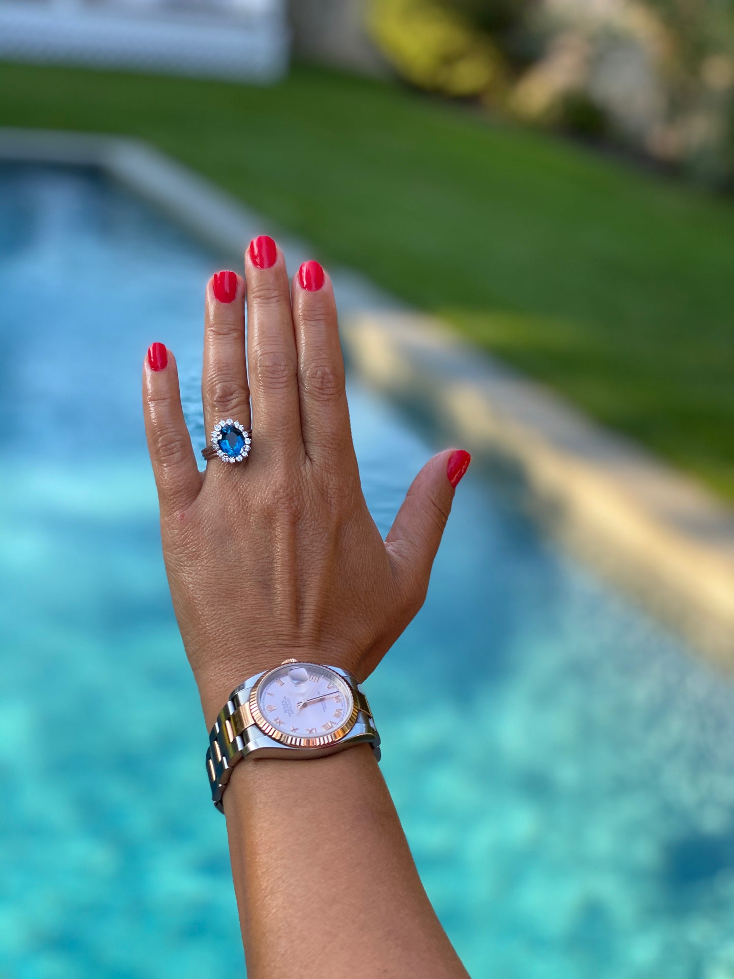 Blue Topaz Ring with a Diamond Halo in 14K White Gold