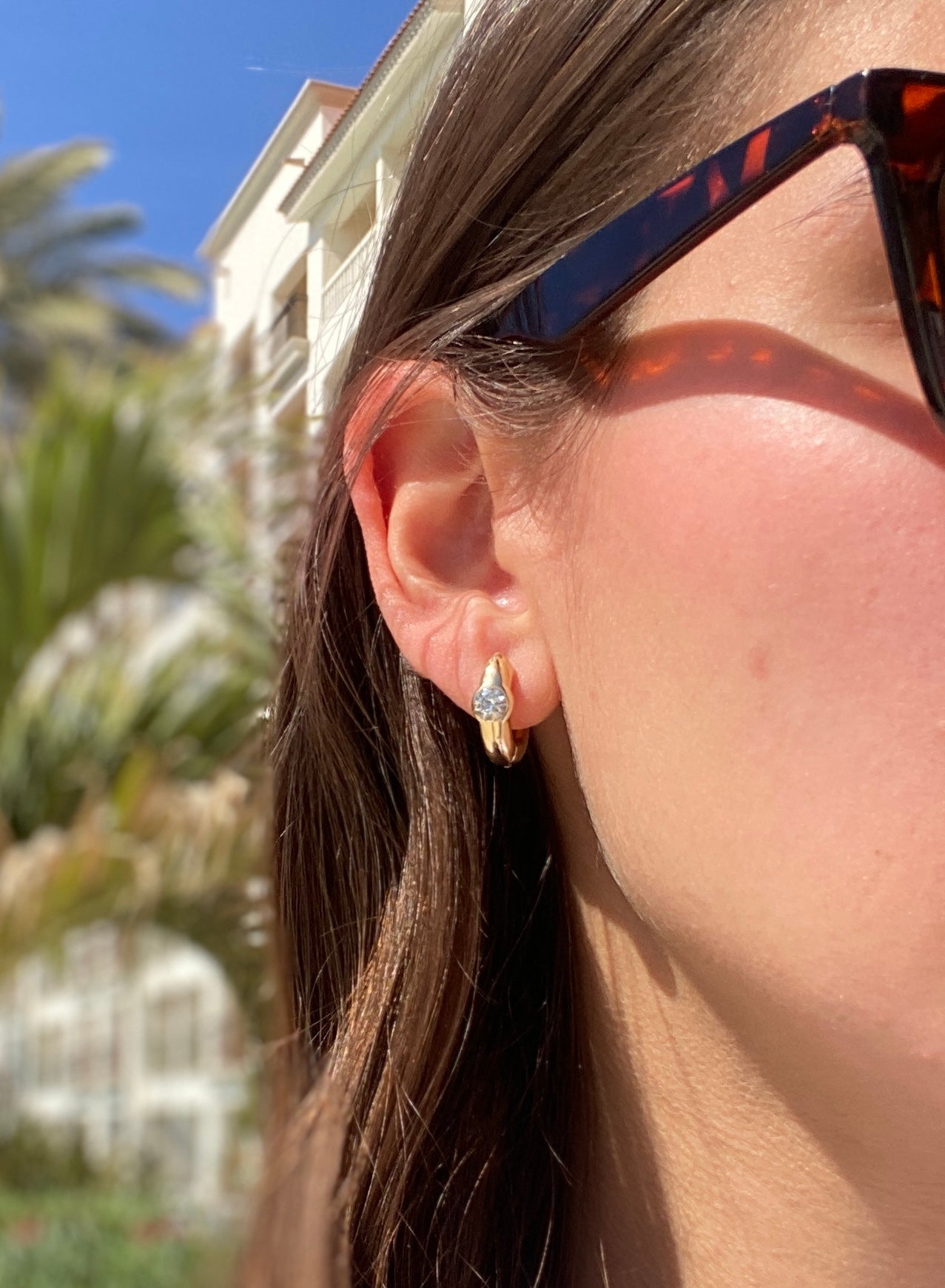 Chunky Emerald and Diamond Huggie Hoop Earrings in 14K Gold