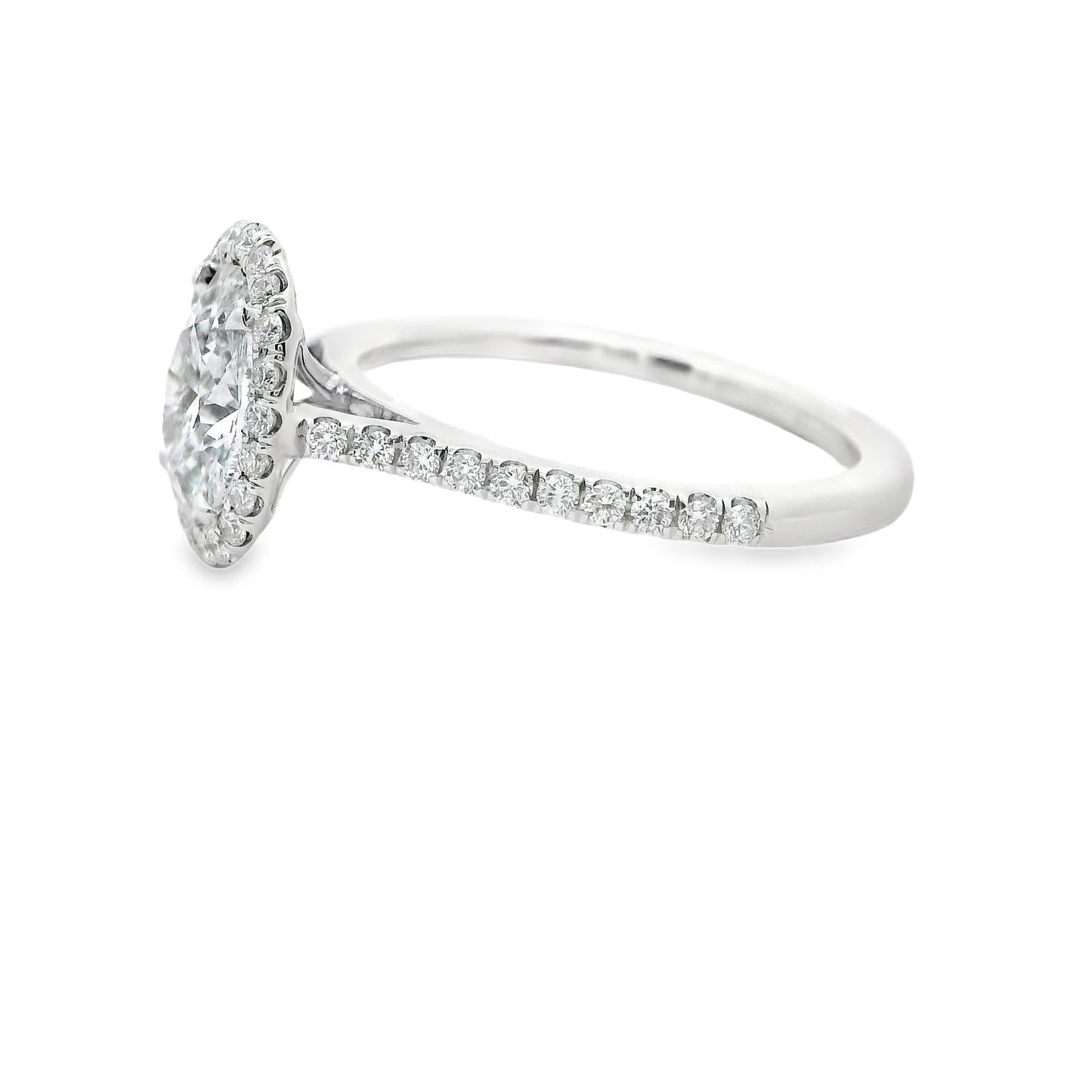 Oval-Cut Diamond Halo Engagement Ring in 14K Yellow Gold.