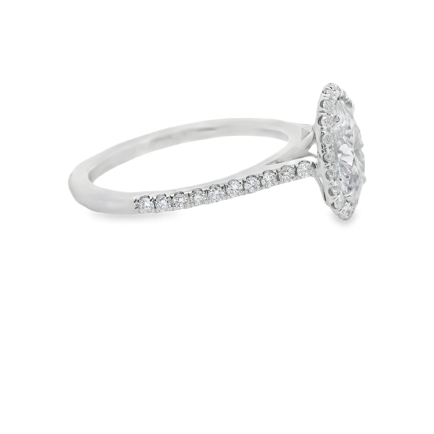 Oval-Cut Diamond Halo Engagement Ring in 14K Yellow Gold.