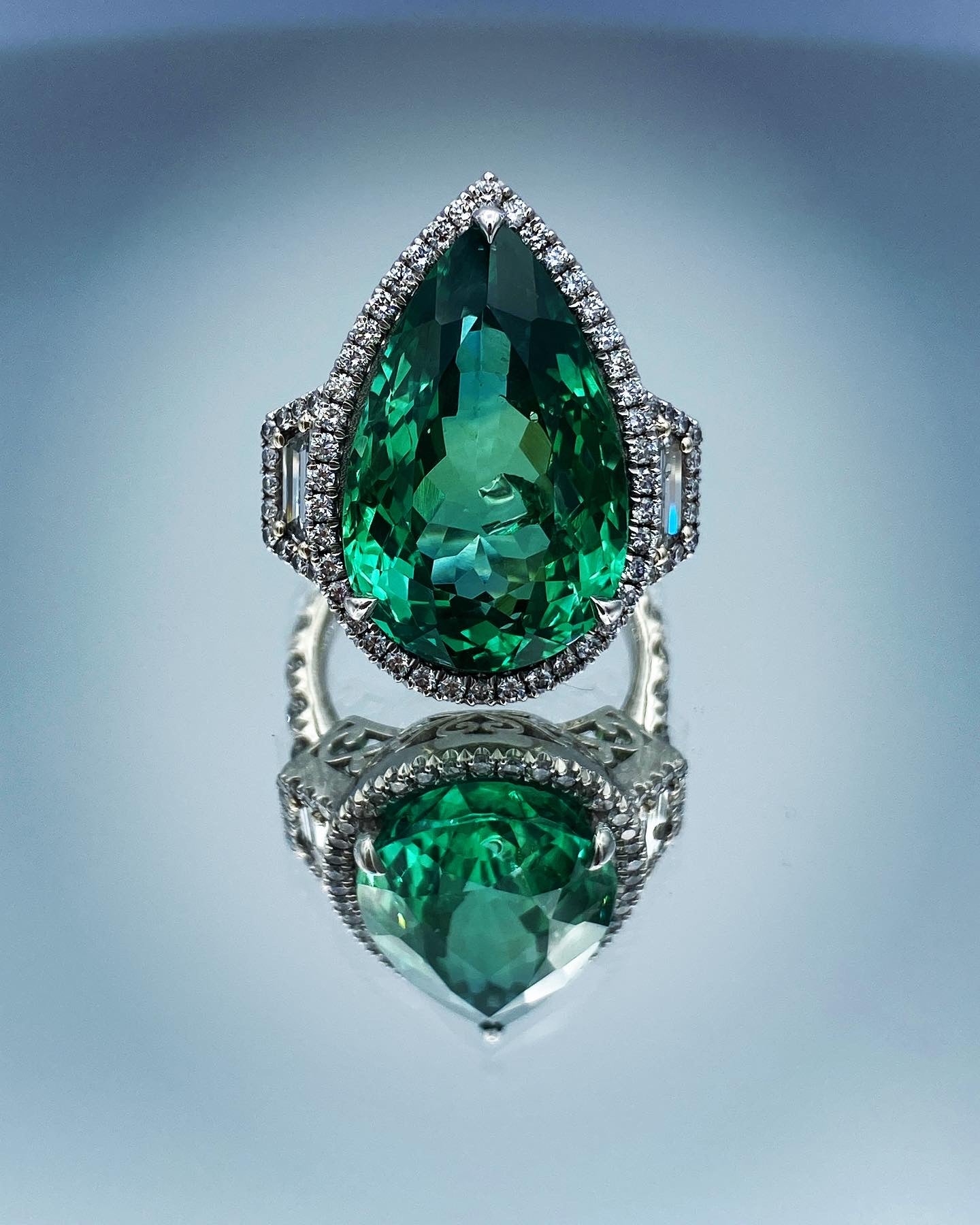 Pear Shape Green Kunzite Ring with Round Brillant-Cut Diamond Halo in Platinum