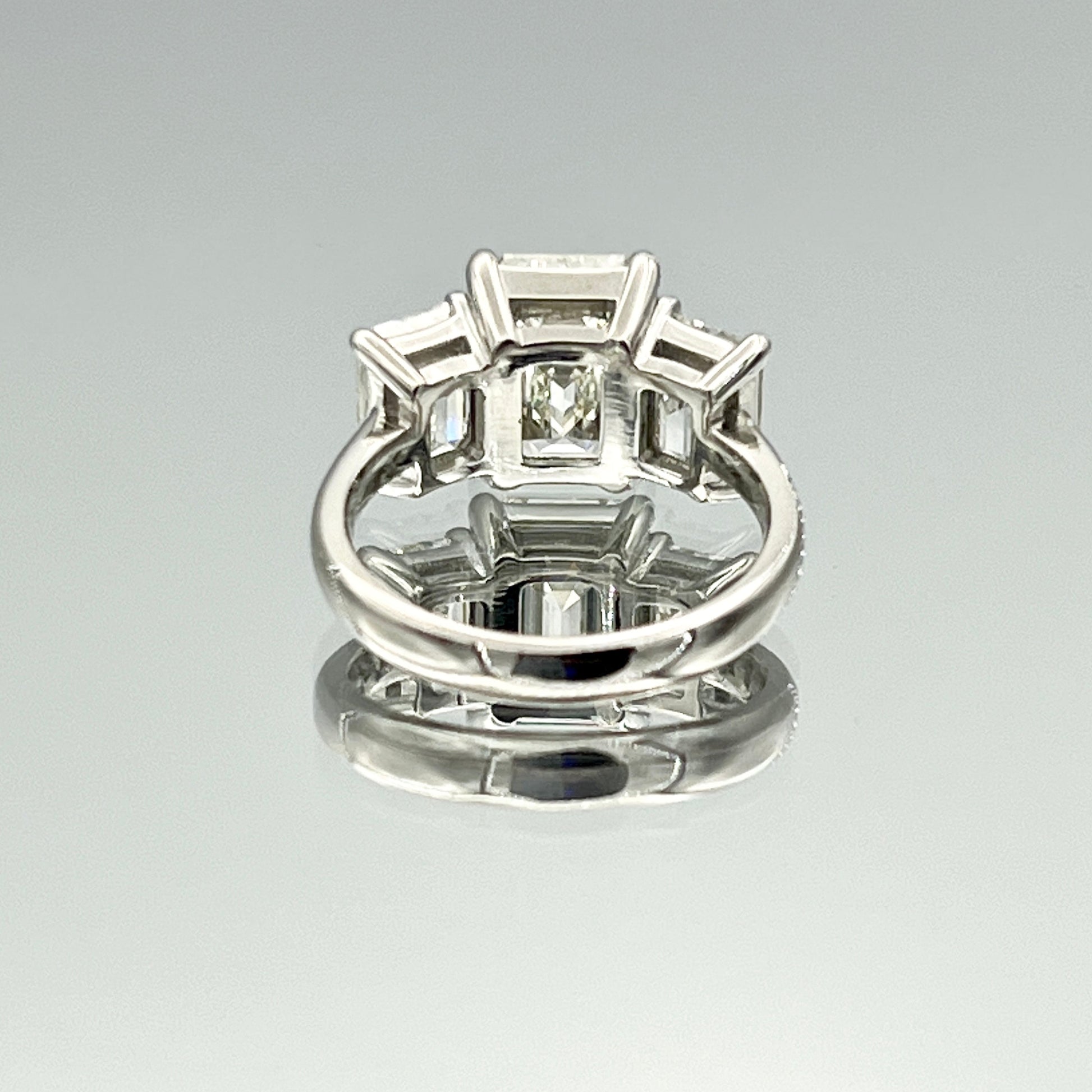 Three-Stone Emerald-Cut Diamond Engagement Ring in Platinum - L and L Jewelry