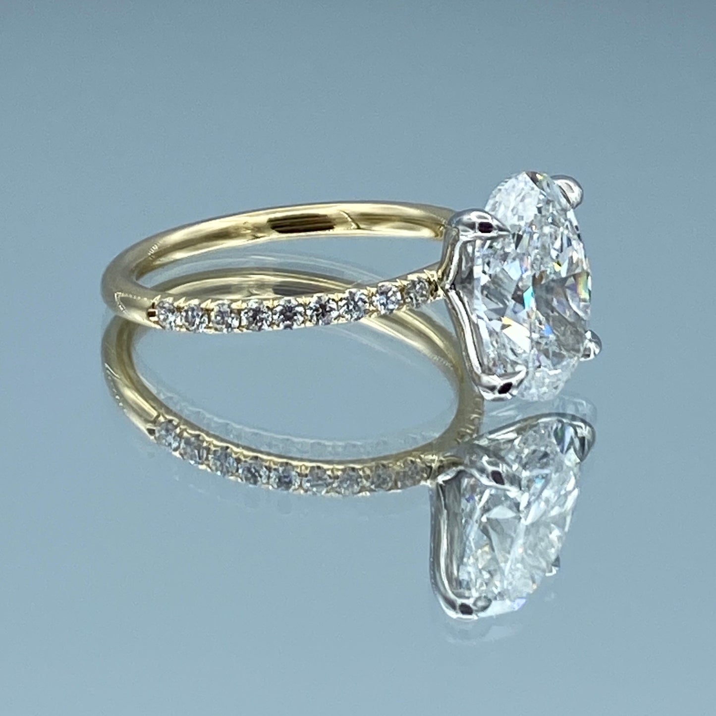 Oval-Cut Diamond Engagement Ring in Platinum and 14K Yellow Gold - L and L Jewelry
