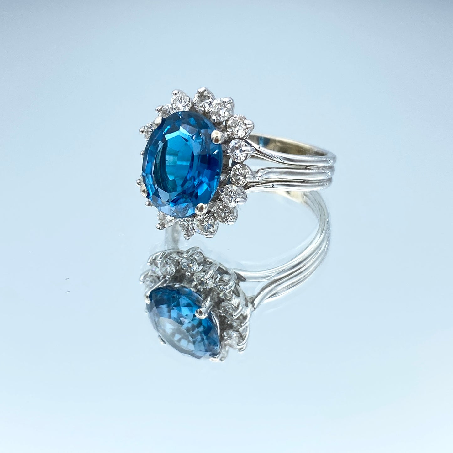 Blue Topaz Ring with a Diamond Halo in 14K White Gold - L and L Jewelry