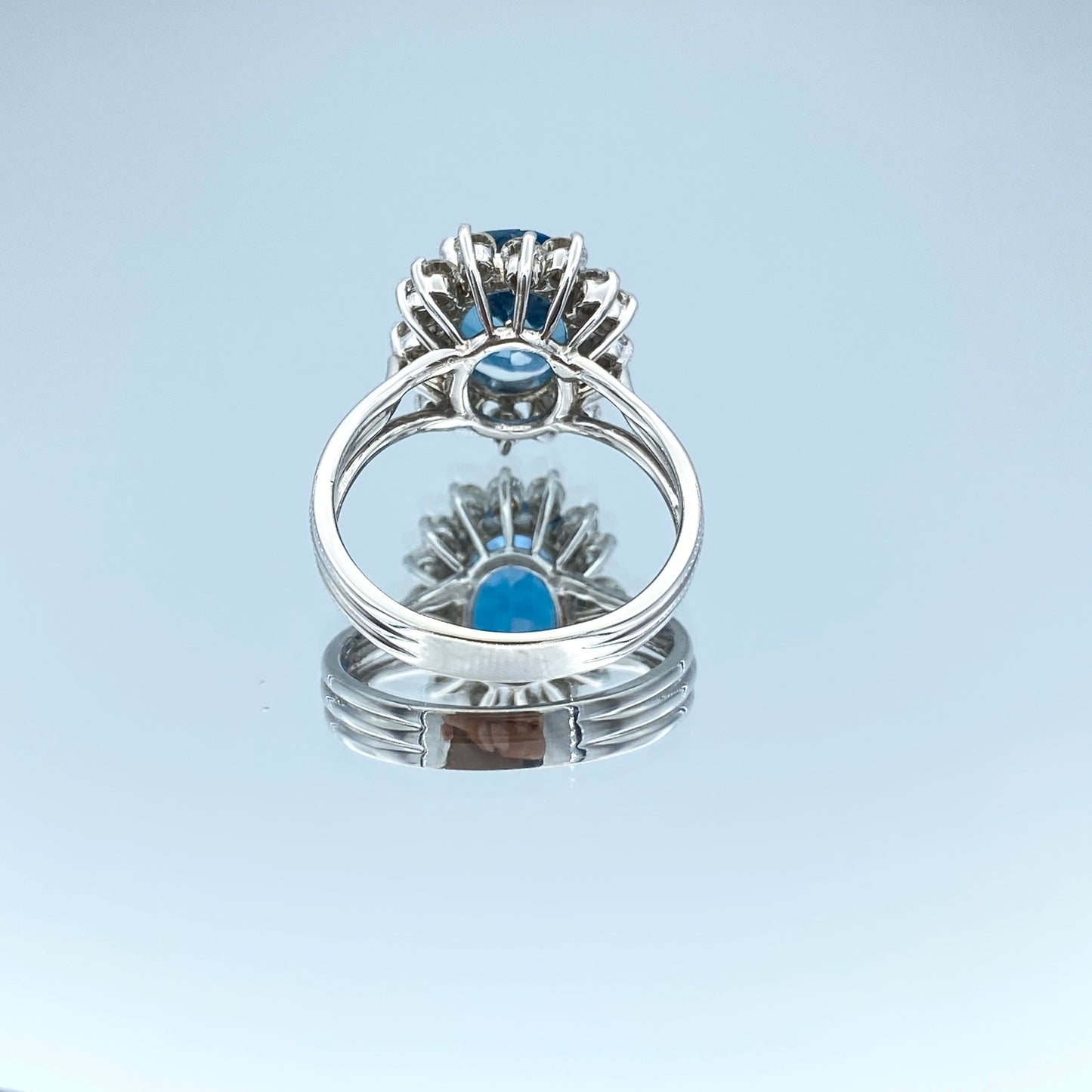 Blue Topaz Ring with a Diamond Halo in 14K White Gold - L and L Jewelry