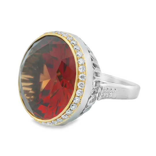Orange Citrine Ring with a Diamond Halo in Platinum