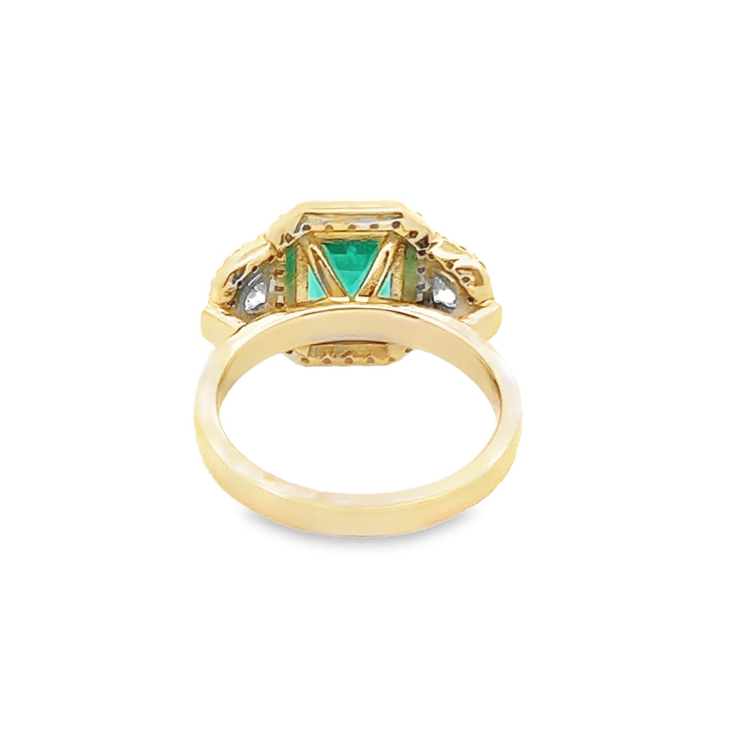 Emerald and Diamond Halo Ring in 14K Yellow Gold