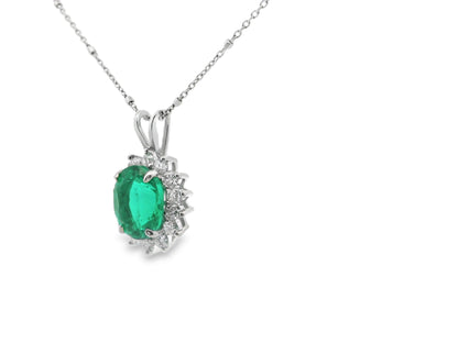 Floral Halo Design Emerald and Diamond Necklace in 14K White Gold