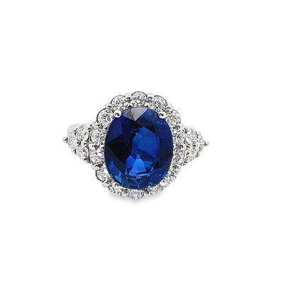 Prong-Set Oval Blue Sapphire Ring with Diamond Halo in 14K White Gold