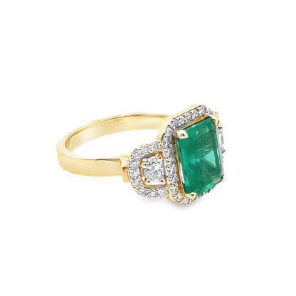 Emerald and Diamond Halo Ring in 14K Yellow Gold