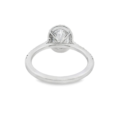 Oval-Cut Diamond Halo Engagement Ring in 14K Yellow Gold.