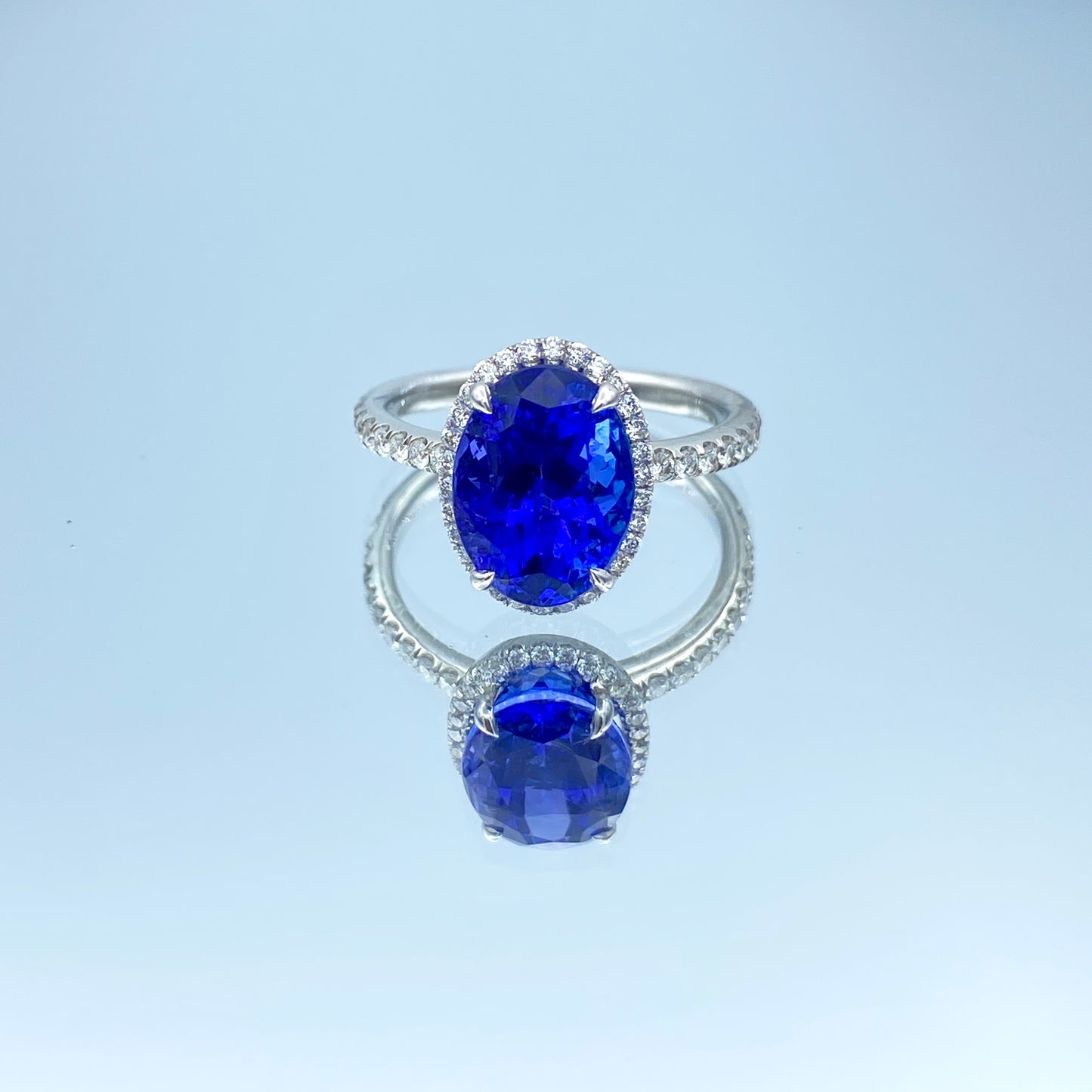 Oval-Cut Tanzanite Ring with Diamond Halo in 14K White Gold - L and L Jewelry