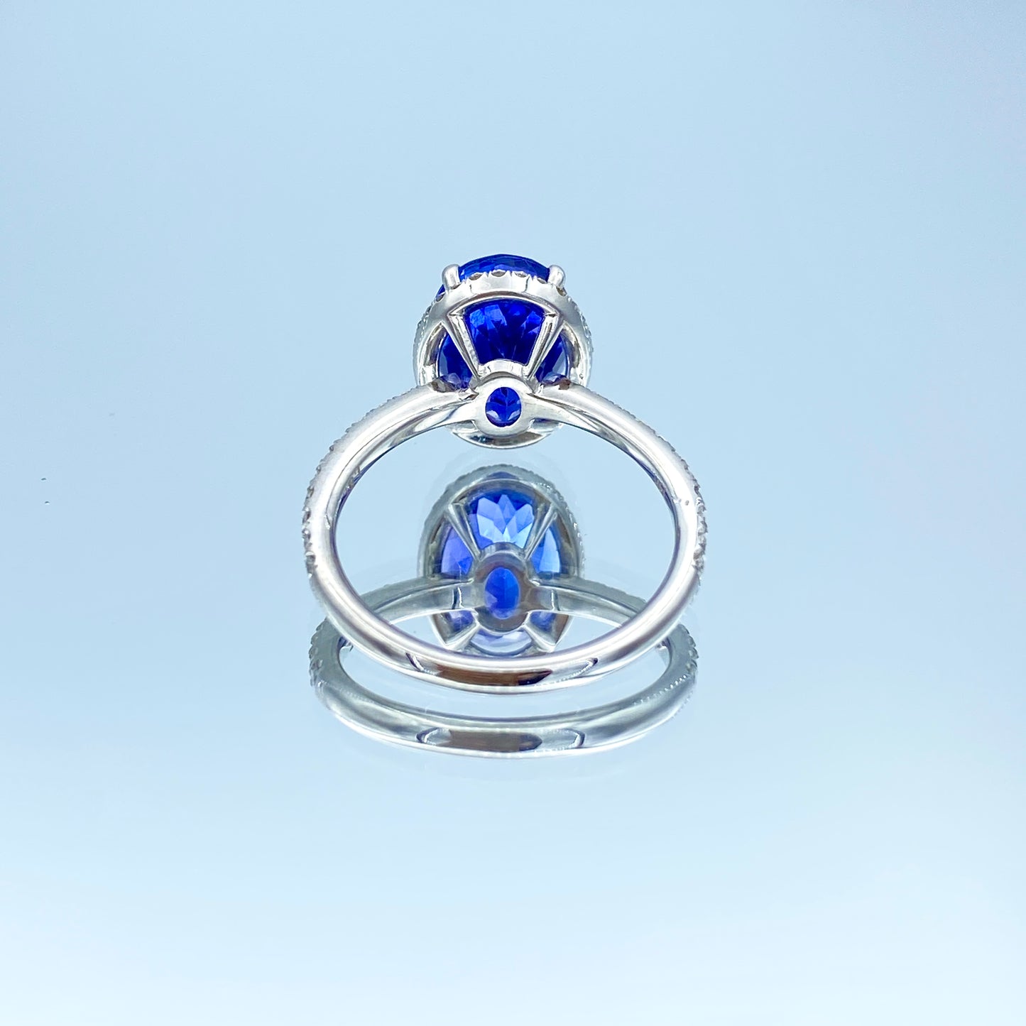 Oval-Cut Tanzanite Ring with Diamond Halo in 14K White Gold - L and L Jewelry