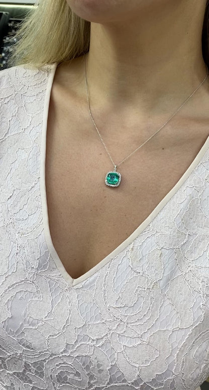 Emerald Pendant Necklace with a Diamond Halo in 14K White Gold