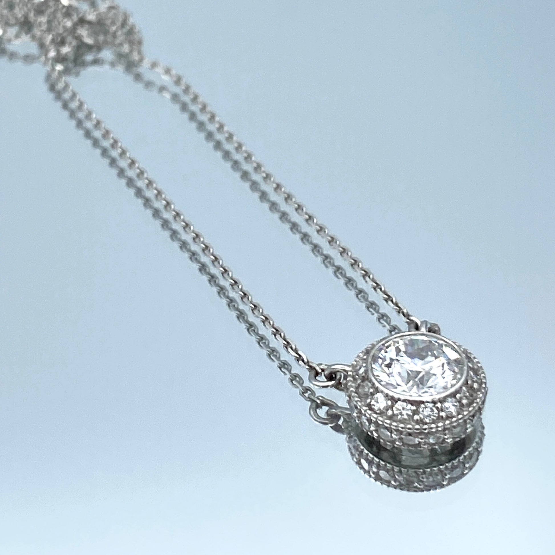 Halo Bezel-Set Round-Cut Diamond Pendant in 14K White Gold – L and