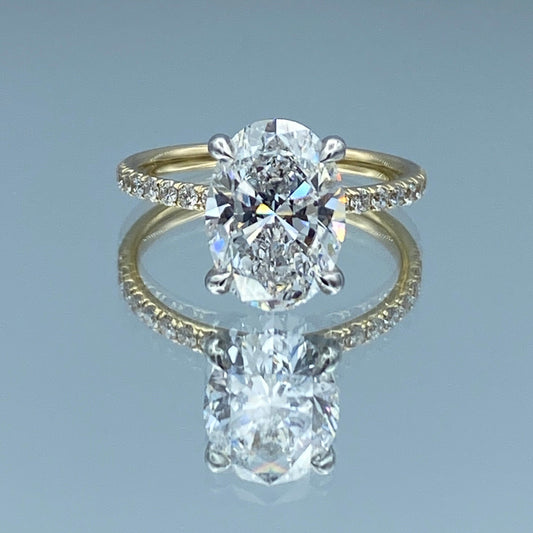 Oval-Cut Diamond Engagement Ring in Platinum and 14K Yellow Gold - L and L Jewelry