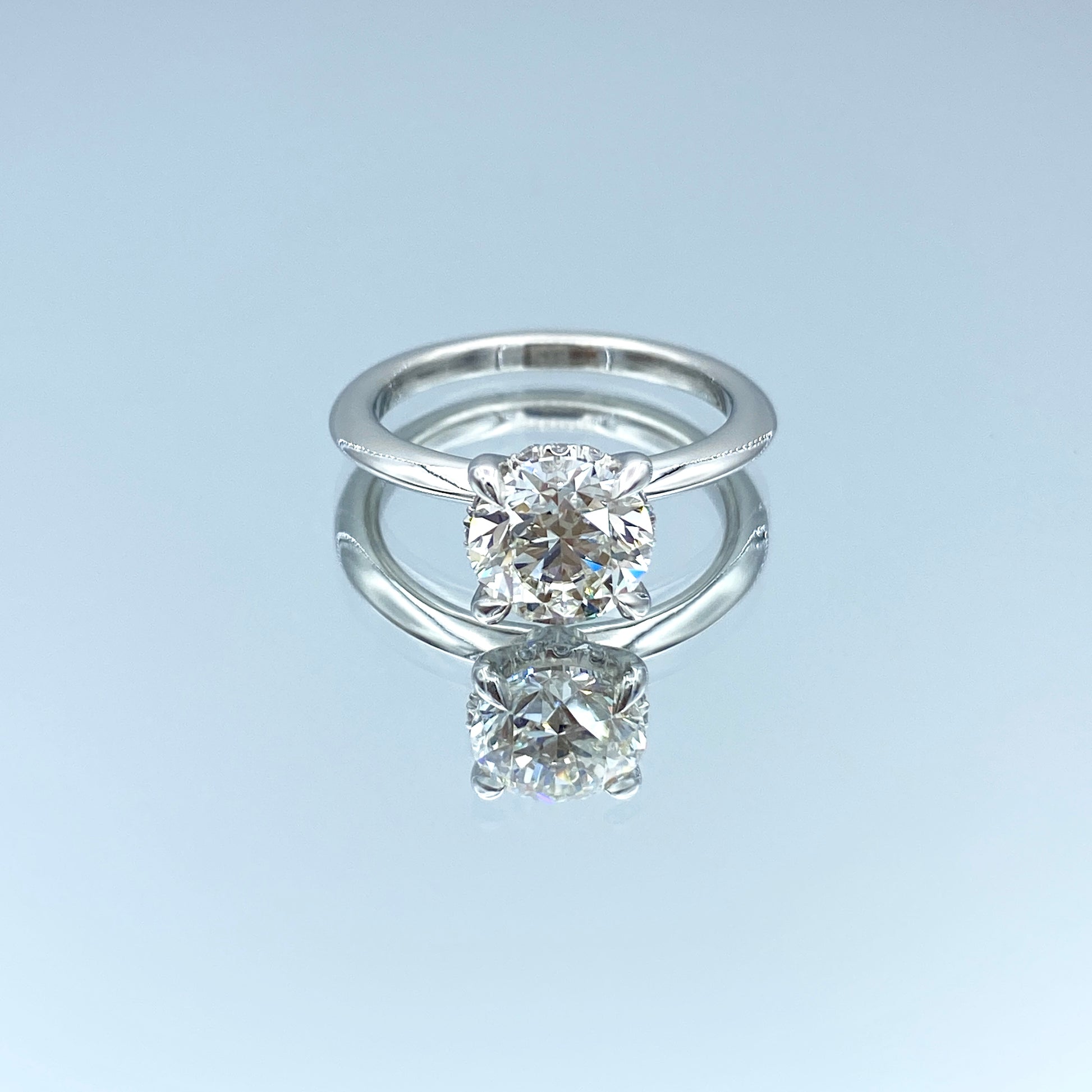 Hidden Halo Round Brilliant-Cut Diamond Engagement Ring in Platinum - L and L Jewelry