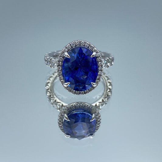 Oval-Cut Blue Sapphire with Diamond Halo in Platinum - L and L Jewelry