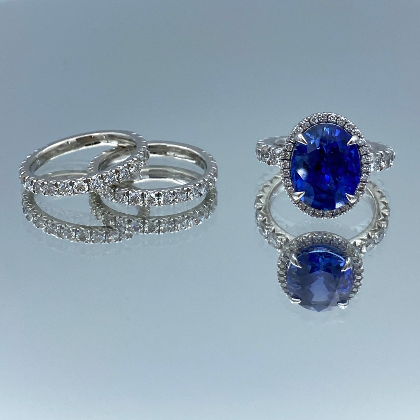 Oval-Cut Blue Sapphire with Diamond Halo in Platinum - L and L Jewelry