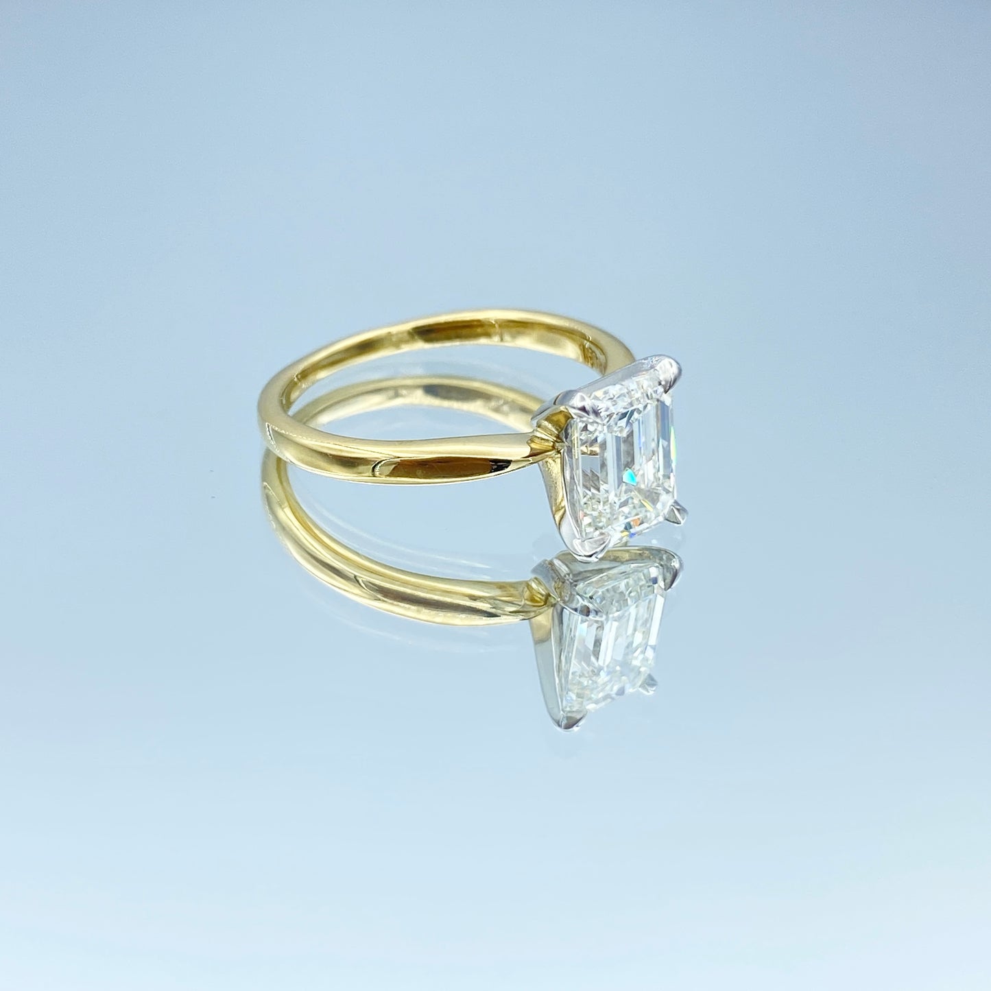 Solitaire Emerald-Cut Diamond Engagement Ring in Platinum and 18K Yellow Gold - L and L Jewelry