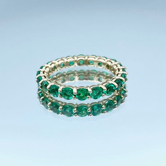 Round-Cut Emerald Eternity Ring in 14K Yellow Gold - L and L Jewelry